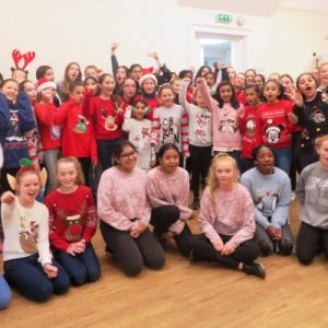 Group of students in Christmas-themed clothes