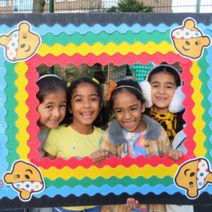 Students in a Pudsey frame