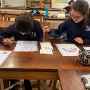 students painting