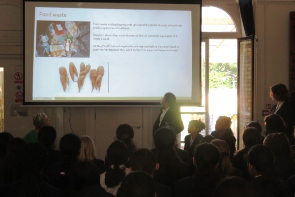 Student discussing a slideshow